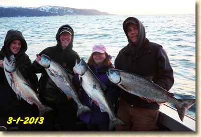Happy anglers with nice Alaska feeder king salmon from Homer fishing with Driftwood Charters.